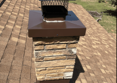A brick chimney redone by Jensen Enterprises